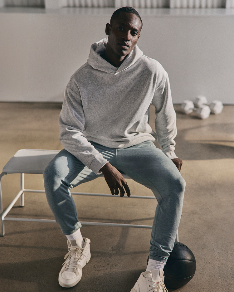 man wearing ponto performance jogger and restore hoodie