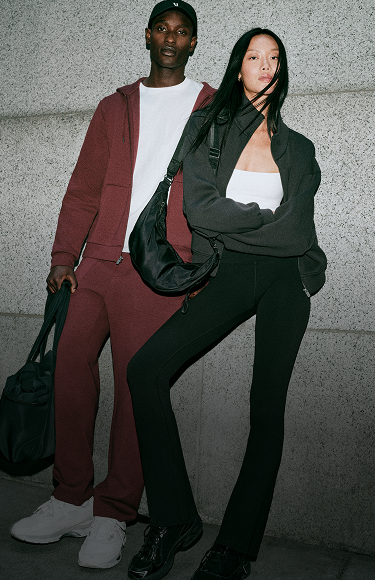 man and woman wearing vuori 