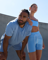 man and woman wearing vuori clothing