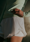 woman wearing vuori daily speed short