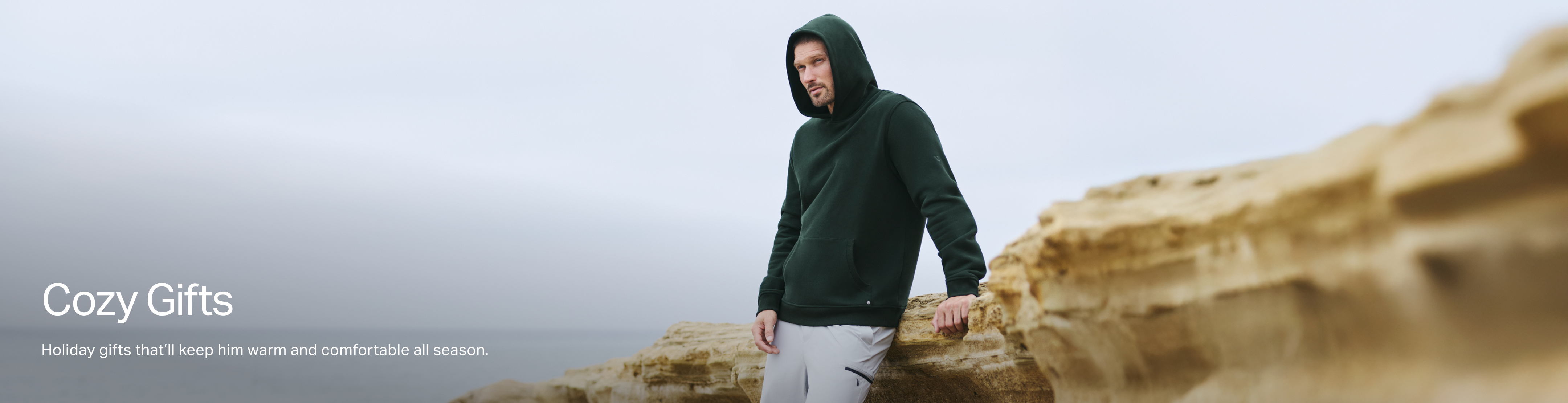 man wearing vuori restore hoodie
