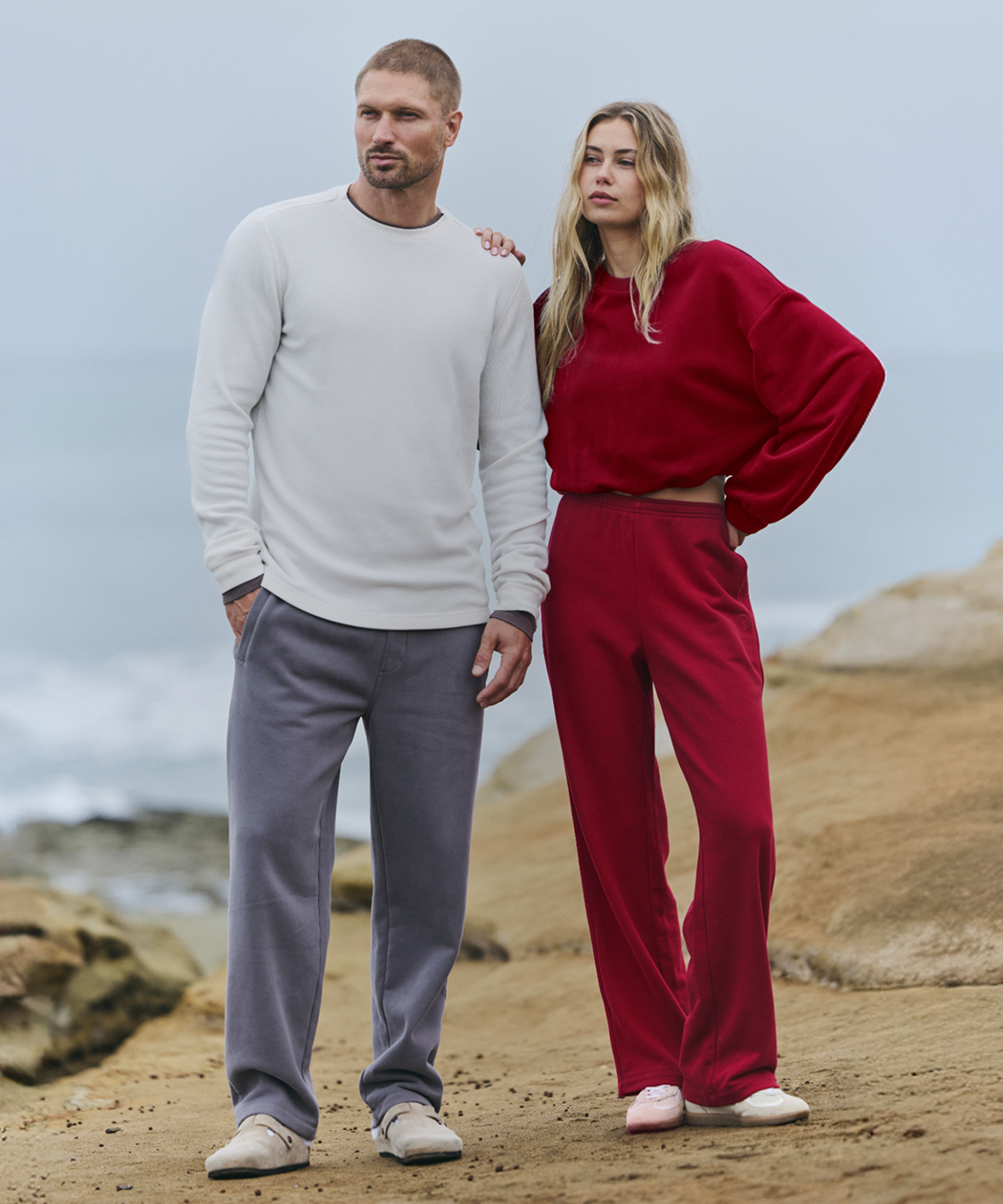 man and woman in vuori clothing