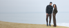 man and woman walking in vuori clothing