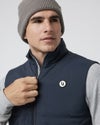 man wearing Echo Insulated Vest 2.0 in Navy