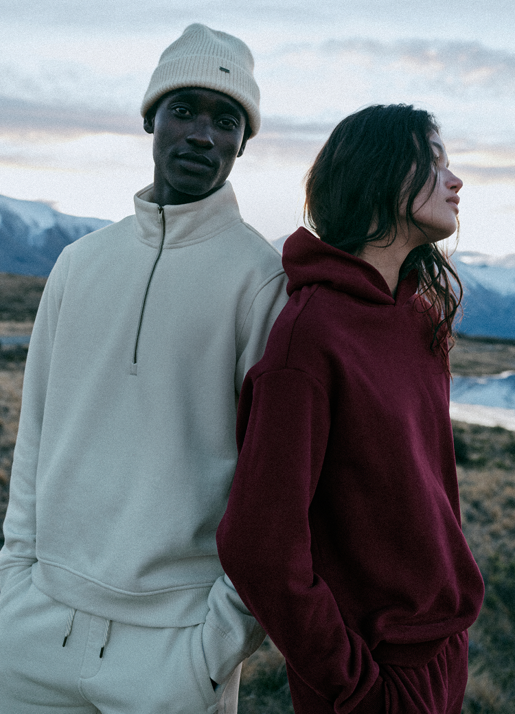 man and woman wearing vuori fleece
