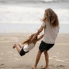 rob machado and son on beach