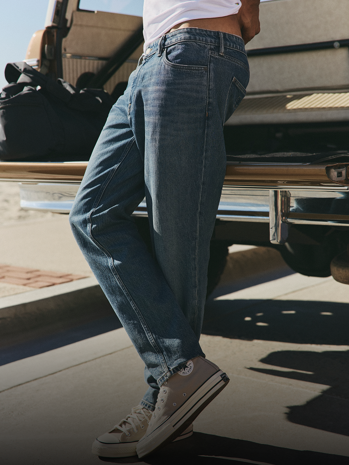 man wearing vuori denim