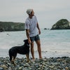 Dylan Efron and dog on beach