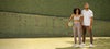 man and woman wearing dreamknit on a basketball court