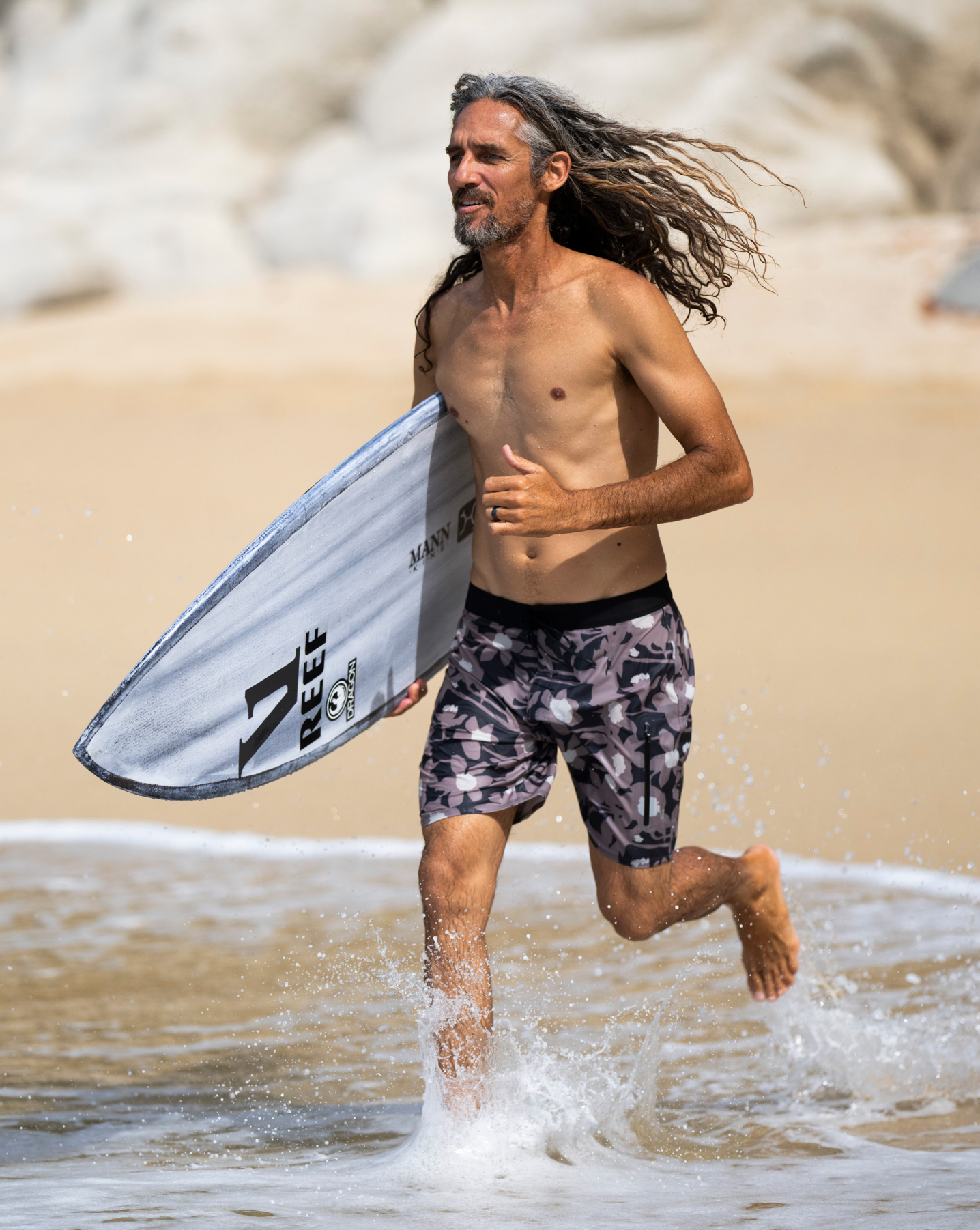 rob machado running in the infinity boardshort