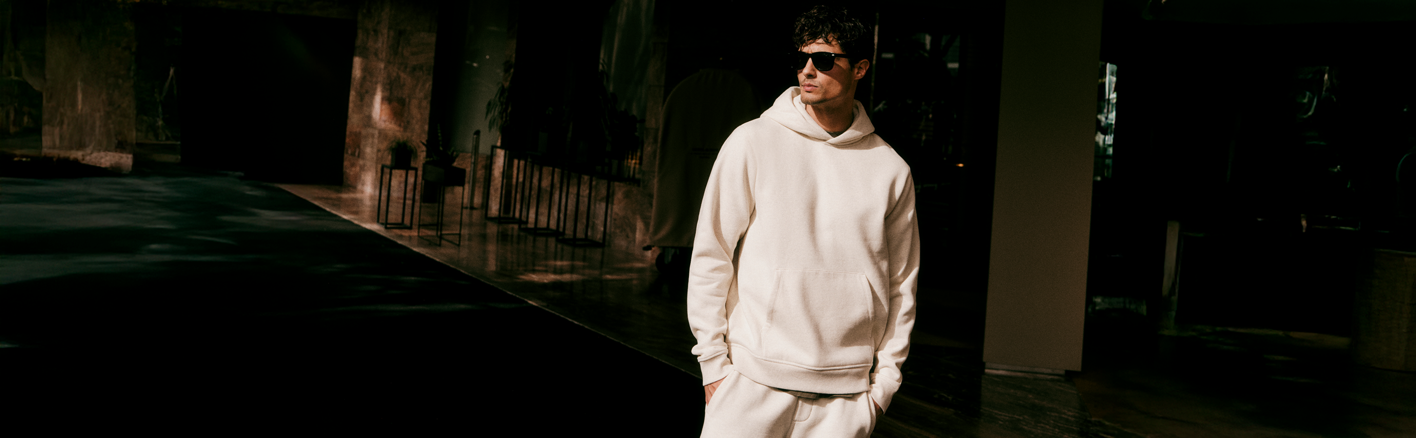 man in seaside hoodie