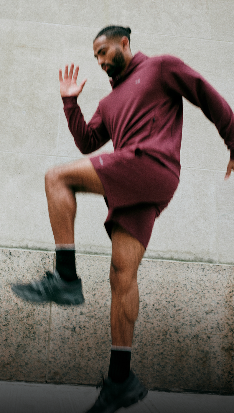 man wearing vuori shorts