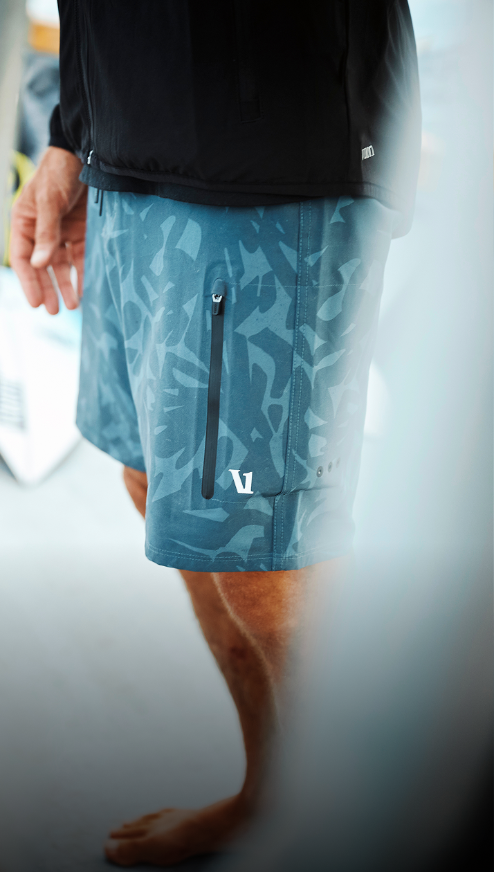 man wearing vuori boardshort