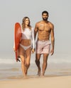 man and woman in vuori swim