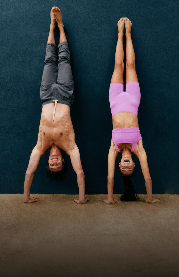 man and woman wearing vuori clothing
