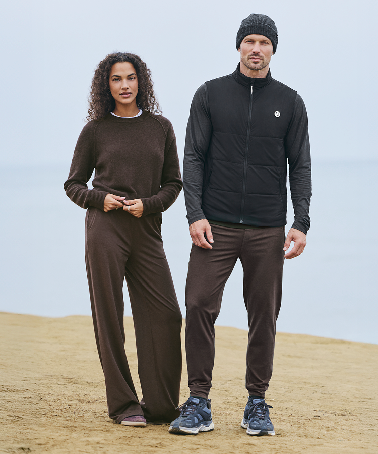 man and woman hugging in vuori clothing