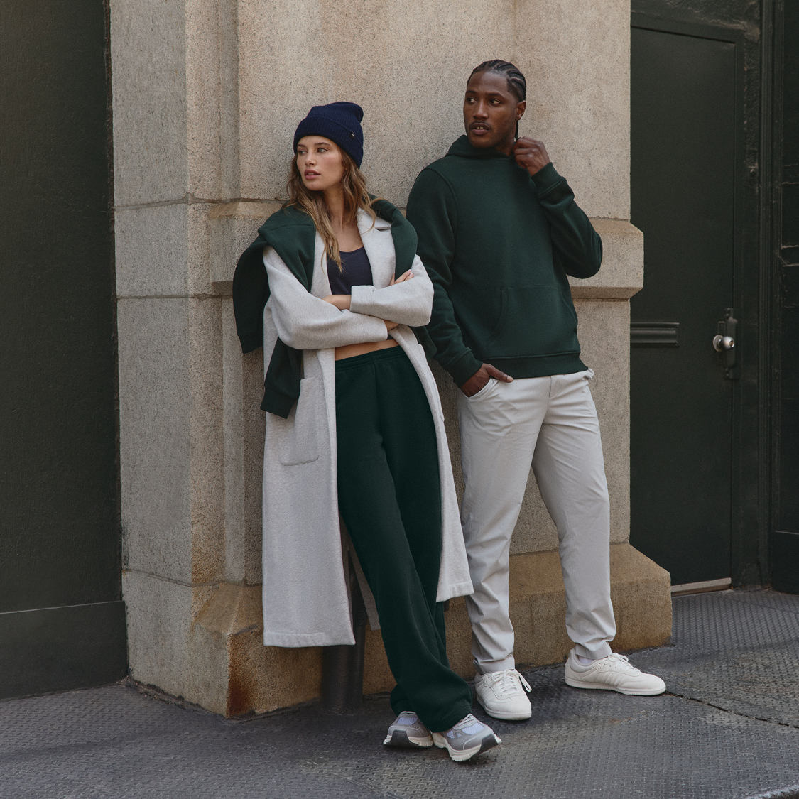 man and woman running up hill
