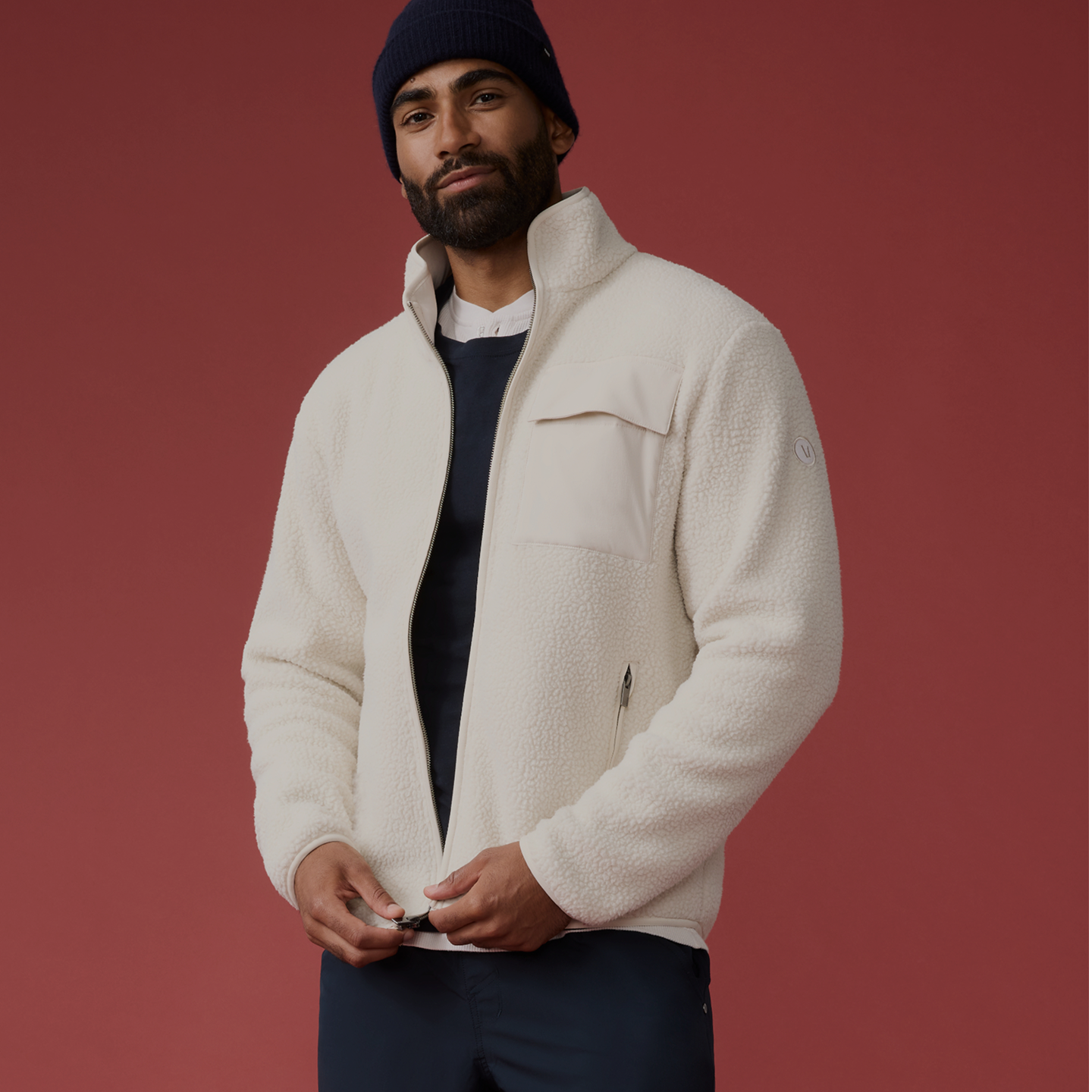 man wearing vuori hoodie