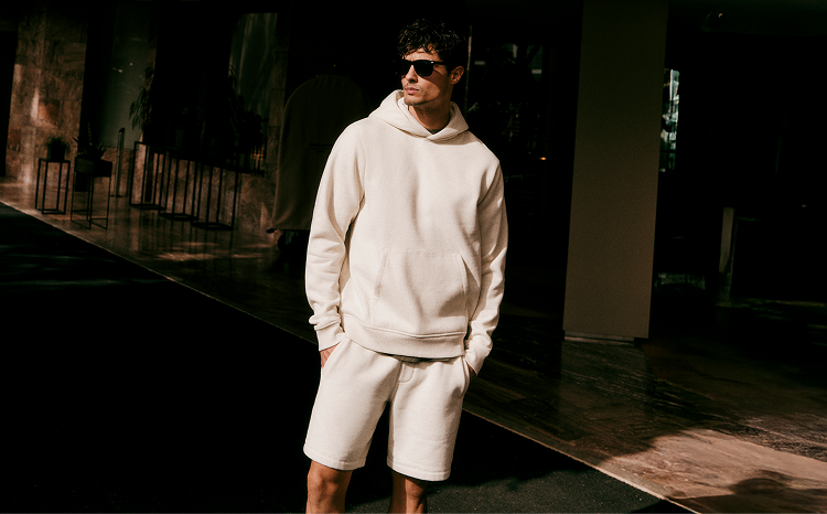man in seaside hoodie