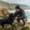 Dylan Efron and dog on beach