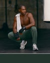 man wearing vuori joggers in green
