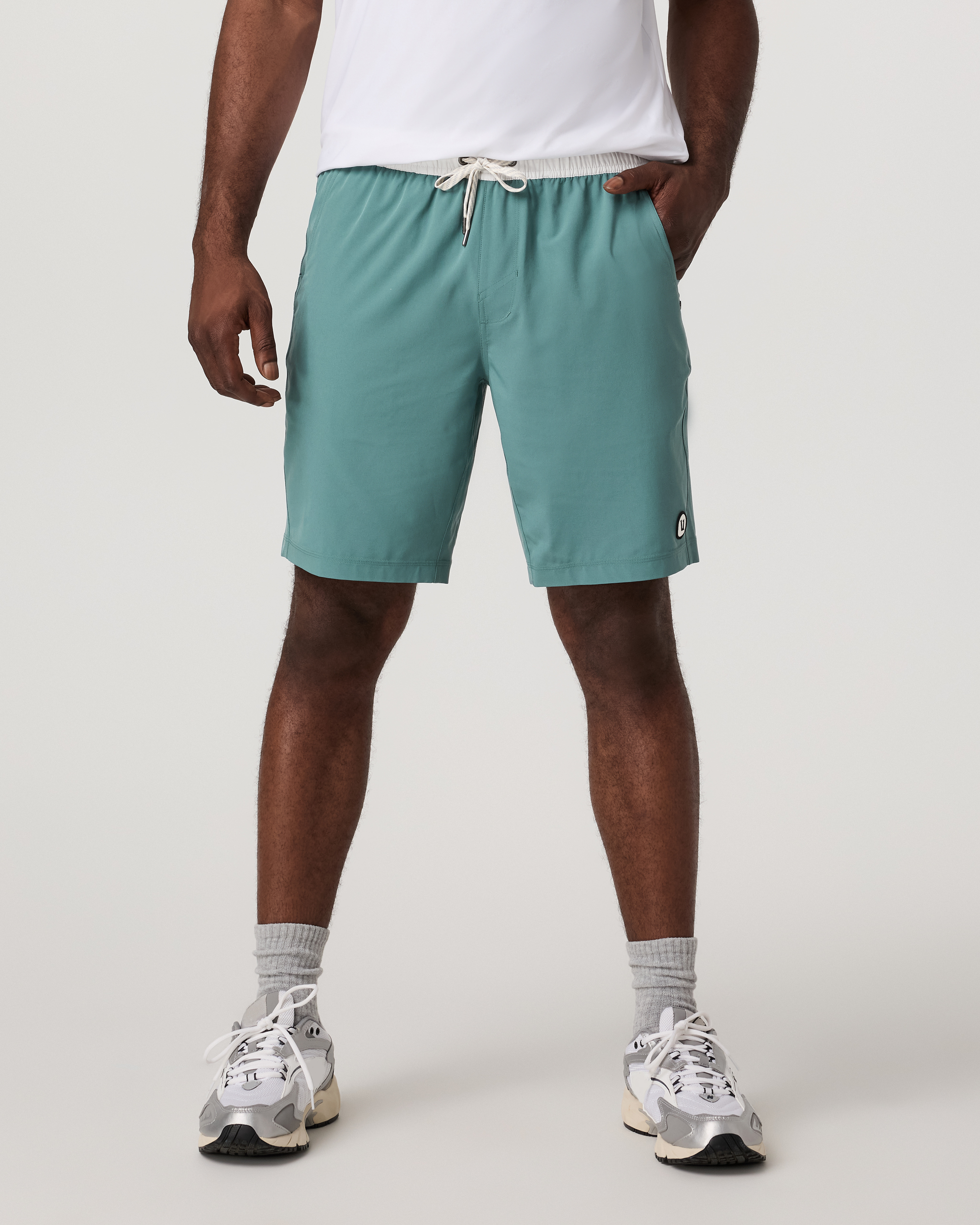 man wearing kore short in bluegrass