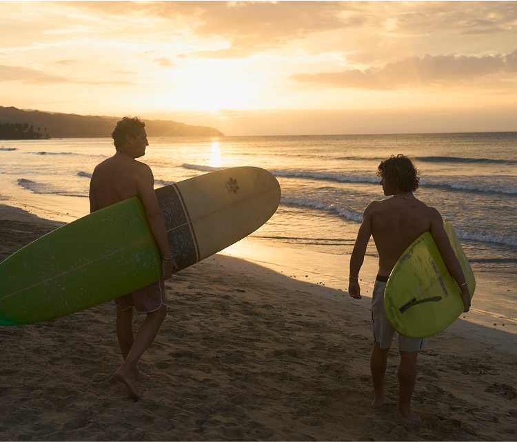 andré and thibault surfing
