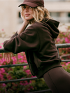 woman wearing vuori hoodie