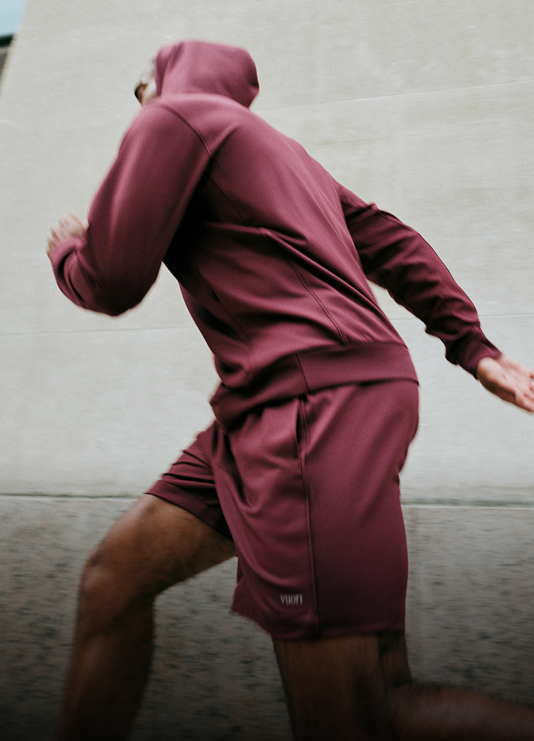 man wearing vuori shorts