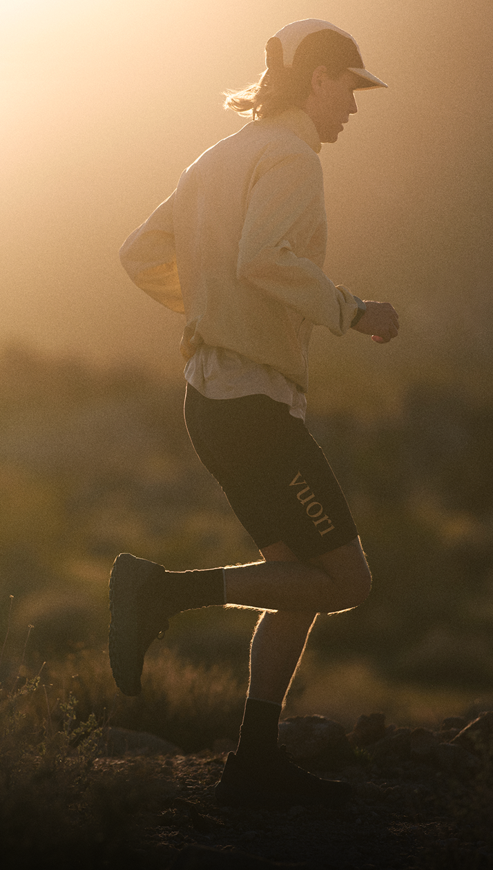 man running in vuori clothing