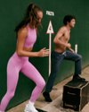 woman and man working out wearing vuori