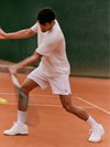 man wearing the vuori hardkore short in fire