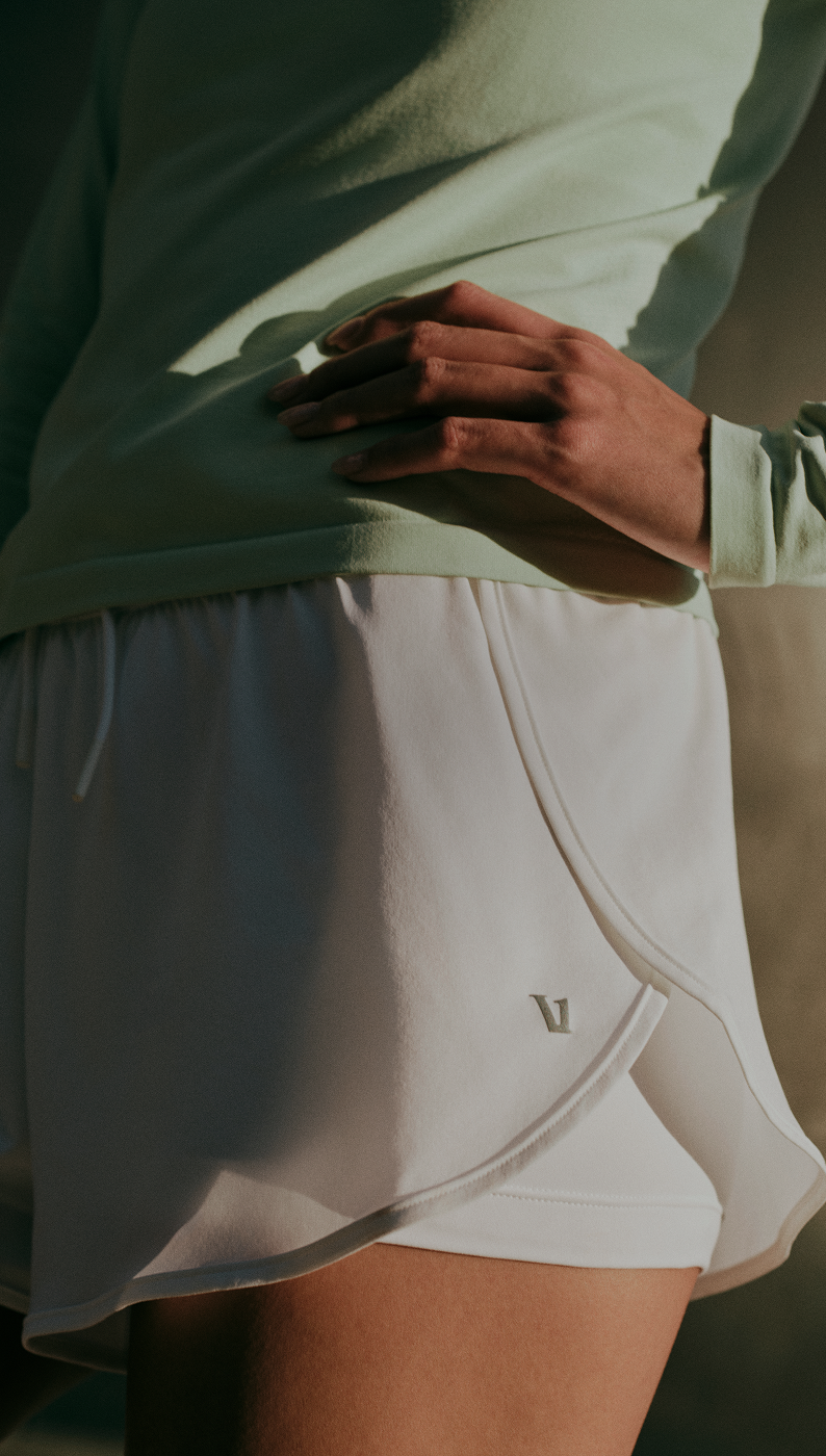 woman wearing vuori daily speed short