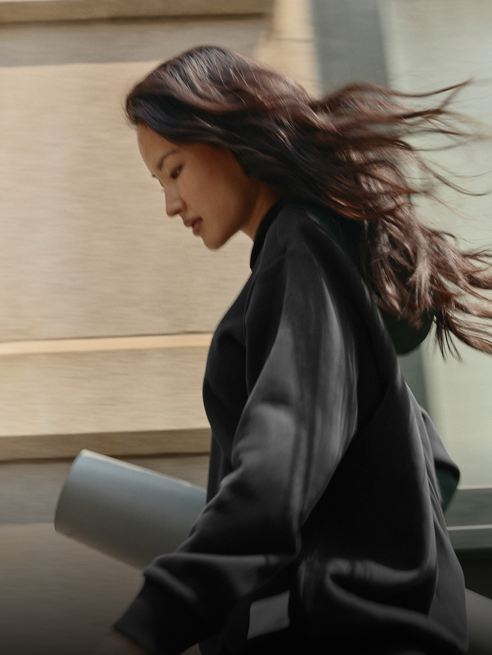 woman with a vuori yoga mat