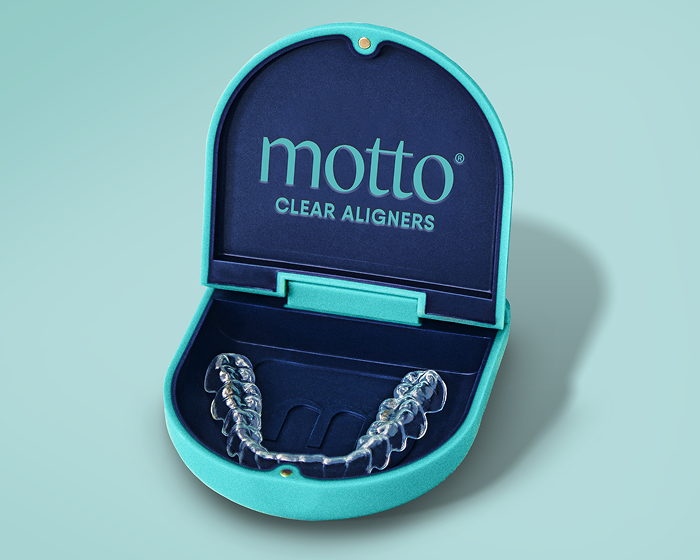 Motto Clear Aligners case from Aspen Dental, offering $300 off clear aligner treatment, featured alongside cosmetic dentistry services.