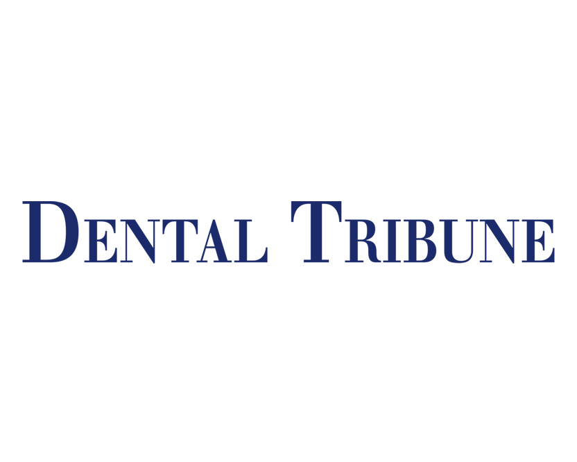 Dental Tribune logo in blue text on a light background