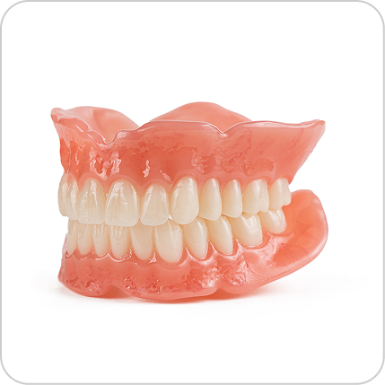 Alt Text: Aspen Dental Signature full dentures with natural tooth shading and textured gum contours.