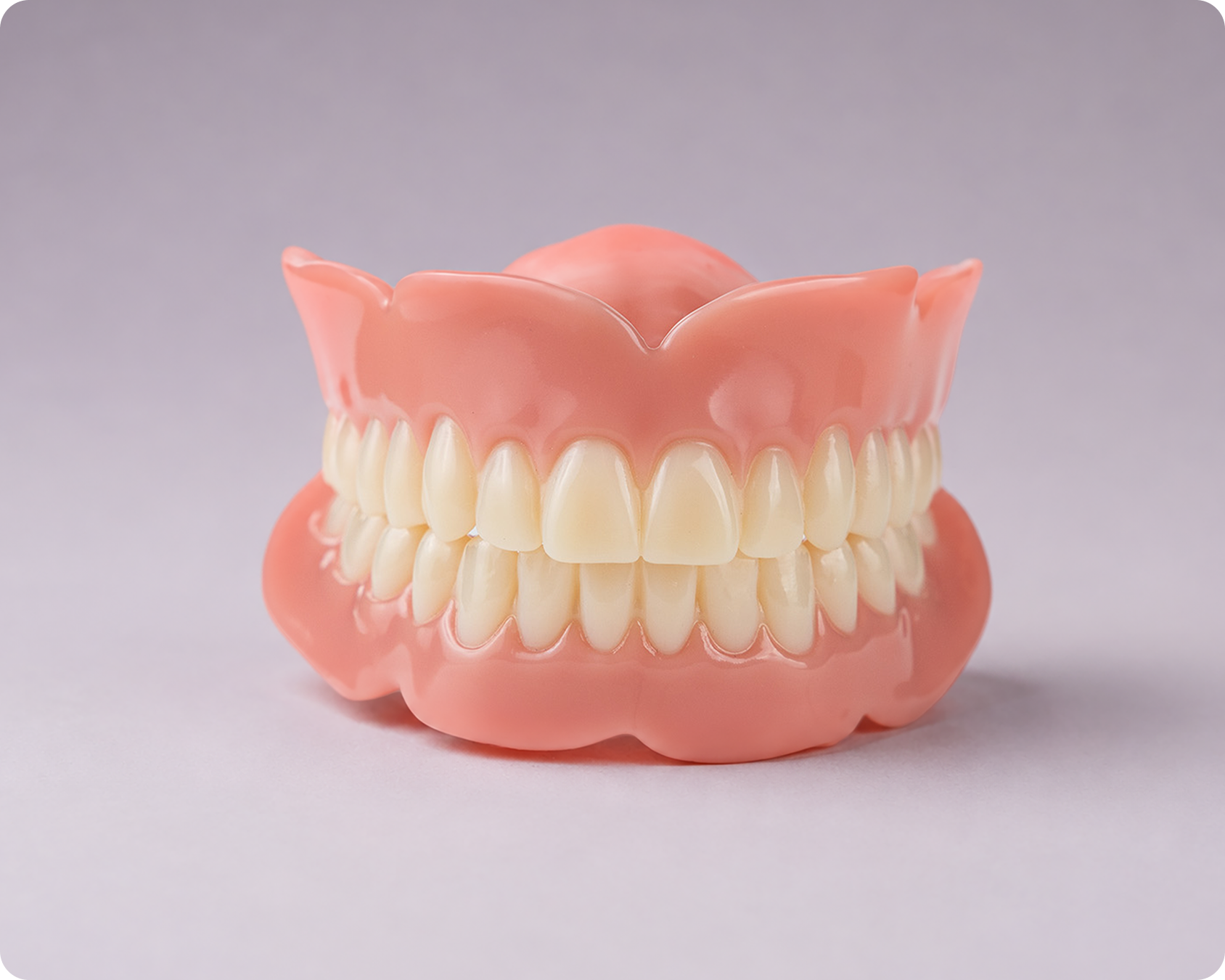 Basic denture option top and bottom against gray background.