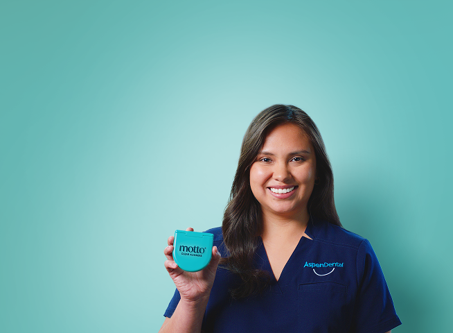 A smiling dental professional holds a teal "my smile" case