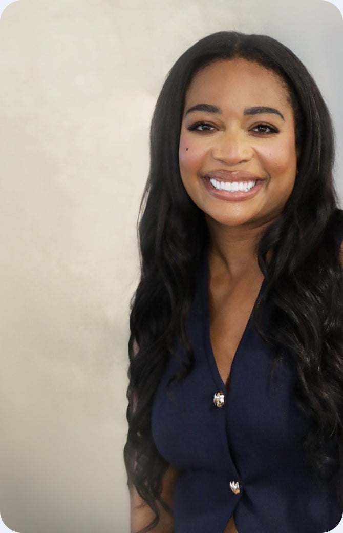 smiling woman with text reading “Every smile. Every budget. Every lifestyle. A path forward.” highlighting accessible dental implant options for different needs