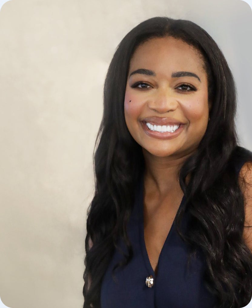 smiling woman with text reading “Every smile. Every budget. Every lifestyle. A path forward.” highlighting accessible dental implant options for different needs