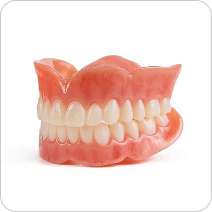 Alt Text: Aspen Dental Classic full dentures with standard tooth design and smooth pink acrylic gums.