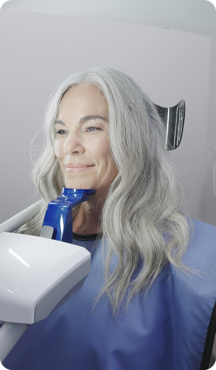 Patient undergoing a 3D dental scan as the first step of ClearChoice's Smile Design process mobile