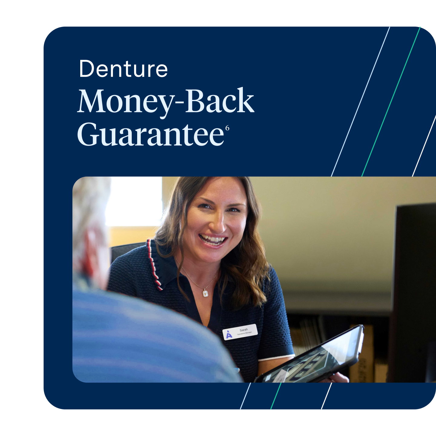  A smiling female Aspen Dental team member named Sarah shows a tablet to a male patient across a desk. The background text advertises the "Denture Money-Back Guarantee."