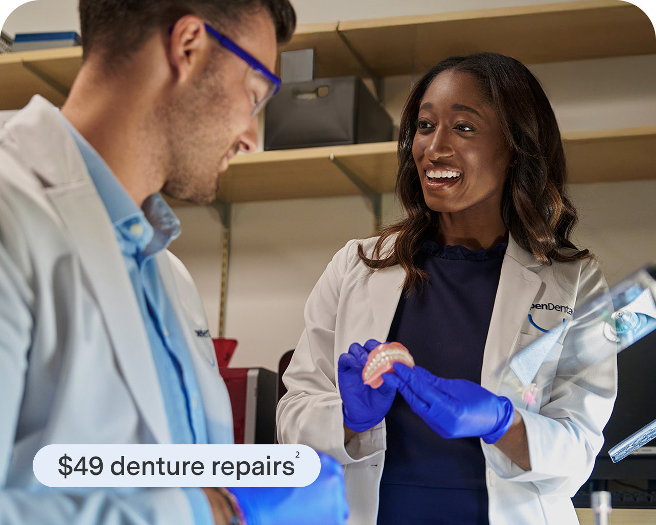 A man and a woman are talking about denture repairs with a light blue graphic overlaid which reads "$49 denture repairs"