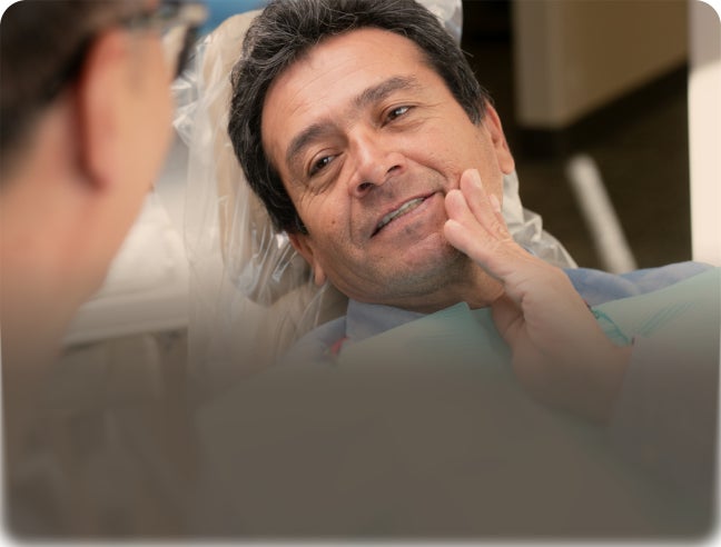 Patient resting in dental chair with text “Your healing guide – Steps to smooth recovery,” promoting ClearChoice dental implant recovery and post-surgery care guidance.