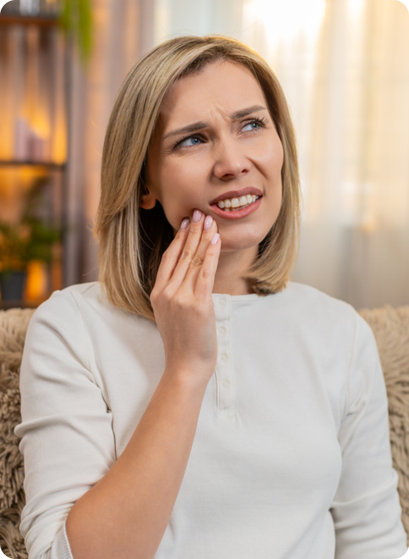 Why is there a sharp bone sticking out of my gum after a tooth extraction?