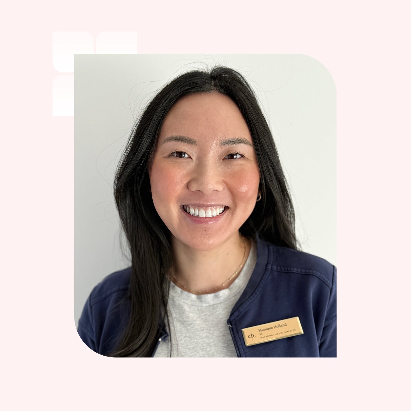 Professional headshot of a smiling woman