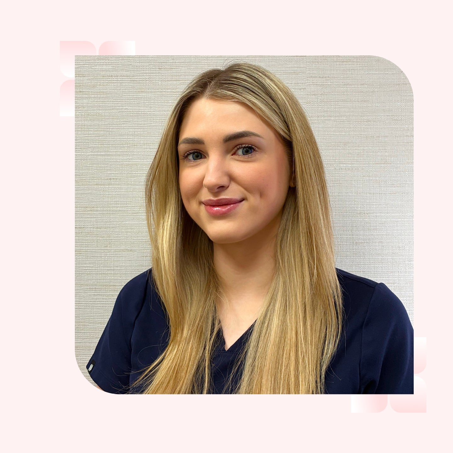 A woman with long blonde hair smiles