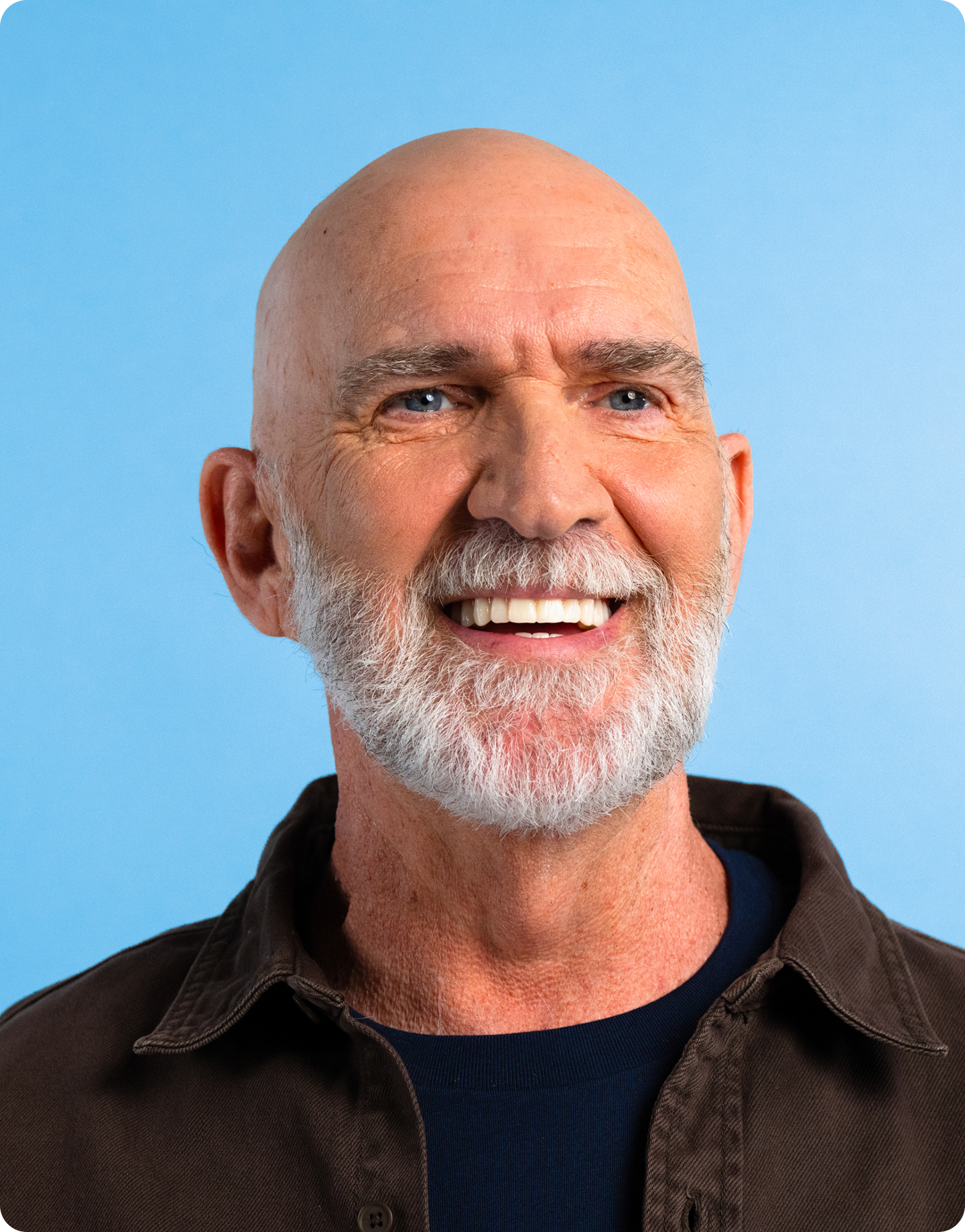 Smiling man with a white beard